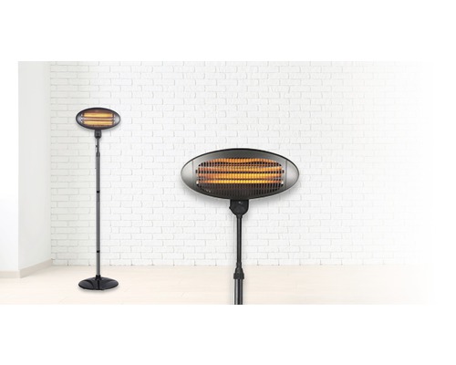 Stehender Heizstrahler mit Infrarot-Technologie vor einer weißen Ziegelwand