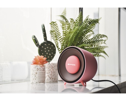 Radiateur soufflant rose avec décoration