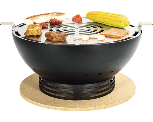 Gril de table avec différents aliments sur la grille.