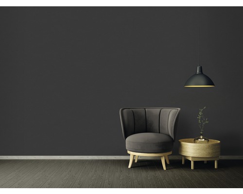 Salon avec fauteuil, table d''appoint et suspension