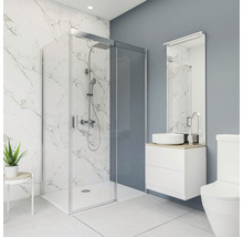 Salle de bains moderne avec cabine de douche, meuble-lavabo et toilettes