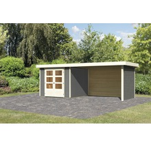 Gartenhaus mit Anbau auf gepflastertem Untergrund vor Bäumen
