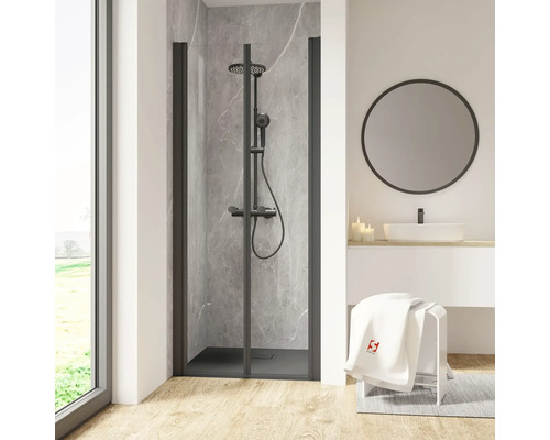 Porte de douche dans niche avec porte battante SCHULTE Garant 2.0 ExpressPlus 90 cm couleur du profilé noir décor de vitre verre transparent avec verre antitache butée de porte à gauche butée de porte à droite Salle de bains moderne avec cabine de douche noire, lavabo et miroir rond