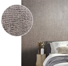 Papier peint textile dans une chambre avec un gros plan de la texture