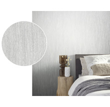 Chambre avec papier peint structuré blanc et gros plan de la structure du papier peint