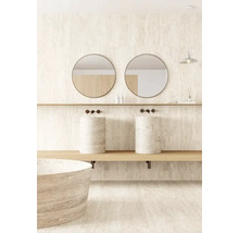 Salle de bains avec double vasque en pierre, miroirs ronds et baignoire