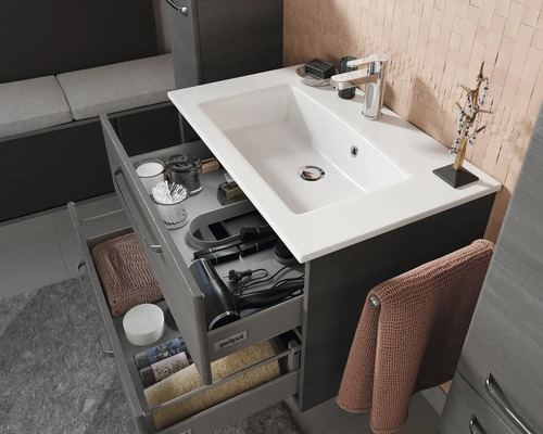 Meuble-lavabo avec système de tiroirs ouverts pour le rangement de la salle de bain