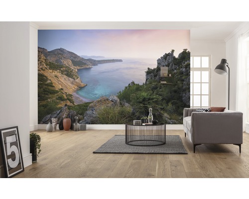 Salon avec papier peint photo d''un paysage côtier