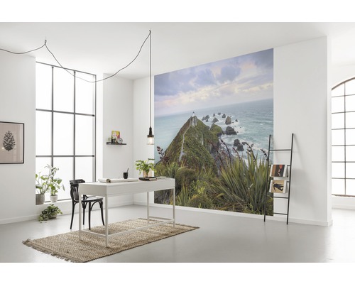 Bureau avec papier peint photo d''un paysage côtier avec phare