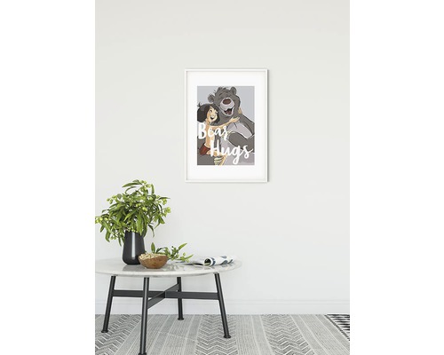 Décoration murale encadrée représentant un garçon et un ours s''embrassant