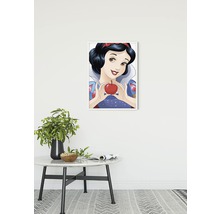 Affiche encadrée de Blanche-Neige sur un mur blanc au-dessus d''une table