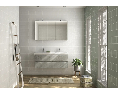 Salle de bain avec meuble sous-lavabo, armoire de toilette et carrelage mural