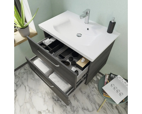 Meuble sous-lavabo avec deux tiroirs ouverts et lavabo