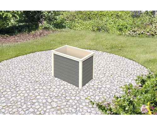 Jardinière grise en bois pour l''extérieur dans le jardin.