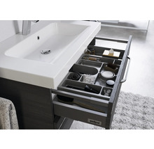 Meuble sous-vasque avec système de tiroirs ouverts pour les accessoires de salle de bain
