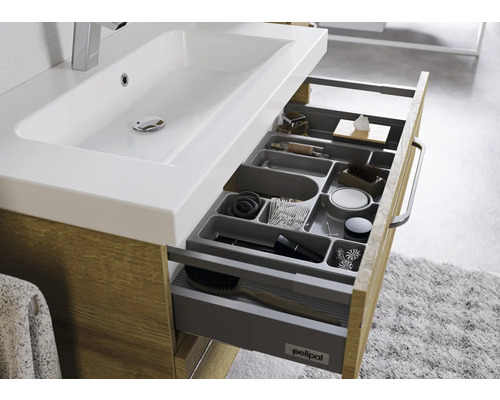 Meuble de salle de bains avec tiroir coulissant et organisation intérieure pour les cosmétiques