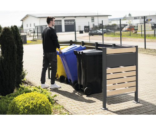 Cache-conteneur avec homme et poubelles