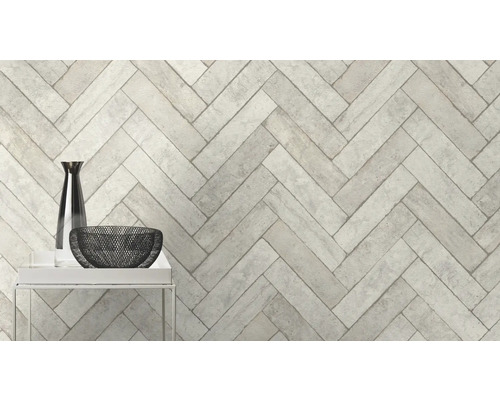 Pose de carreaux muraux en motif à chevrons