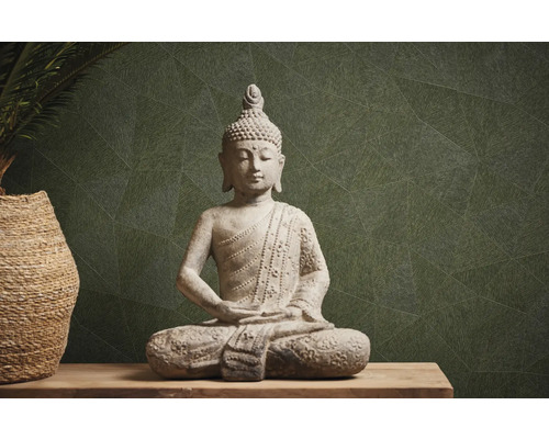 Statue de Bouddha en pierre sur une table