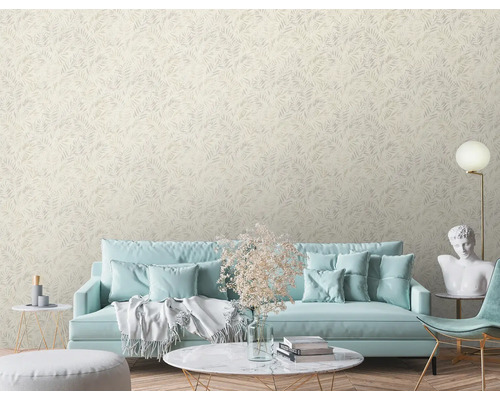 Salon avec canapé et papier peint à motifs