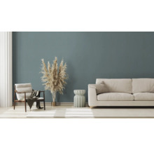 Salon avec canapé, fauteuil et graminées d''ornement décoratives