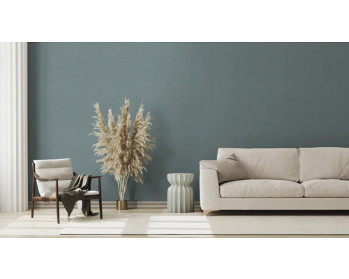 Salon avec canapé, fauteuil et graminées d''ornement décoratives