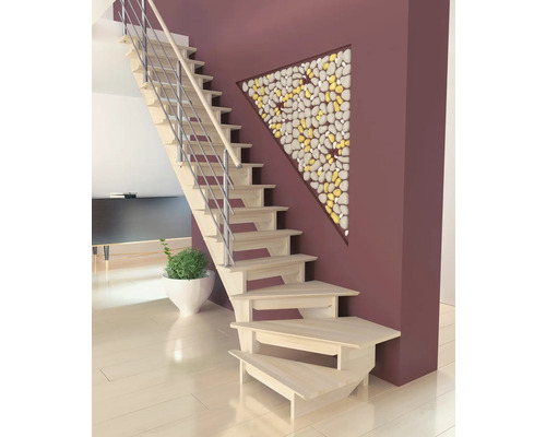 Escalier en bois avec rampe en métal dans une pièce à vivre lumineuse