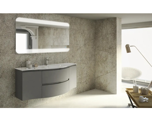 Salle de bains moderne avec meuble sous-lavabo, lavabo et miroir éclairé