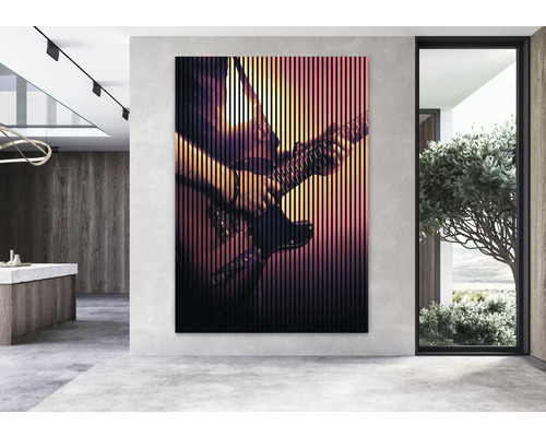 Grande décoration murale avec motif de guitariste dans une pièce moderne