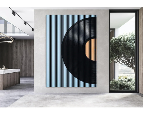 Tableau mural avec motif de disque vinyle dans un espace de vie moderne
