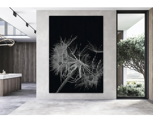 Image murale décorative avec motif de plante dans un espace de vie moderne.