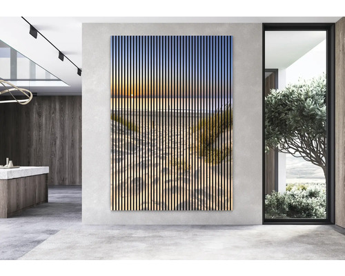 Panneau mural décoratif avec motif de plage dans une pièce aménagée de manière moderne.