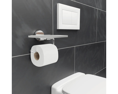 Porte-papier toilette avec étagère sur un mur carrelé