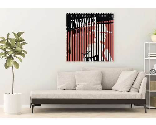 Tableau décoratif sur toile avec motif graphique au-dessus d''un canapé