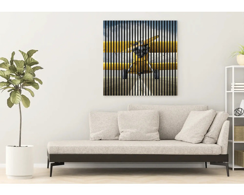 Art mural décoratif avec motif d''avion au-dessus d''un canapé