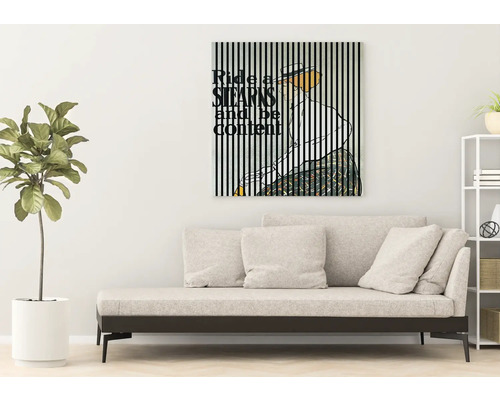 Salon avec canapé et reproduction d''art encadrée au mur