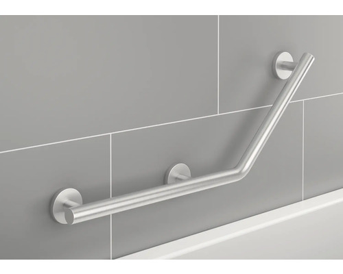 Barre d''appui en acier inoxydable sur mur carrelé dans la salle de bains