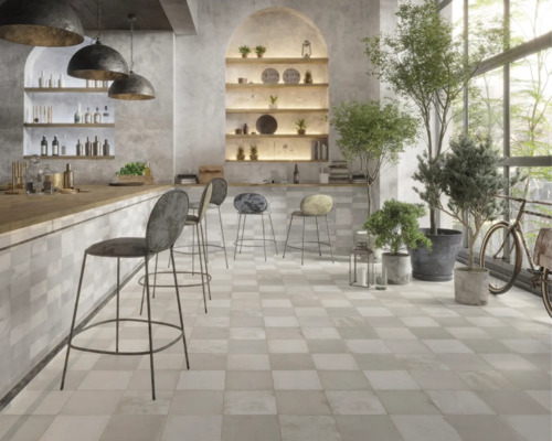 Intérieur avec bar, tabourets de bar et carreaux en damier