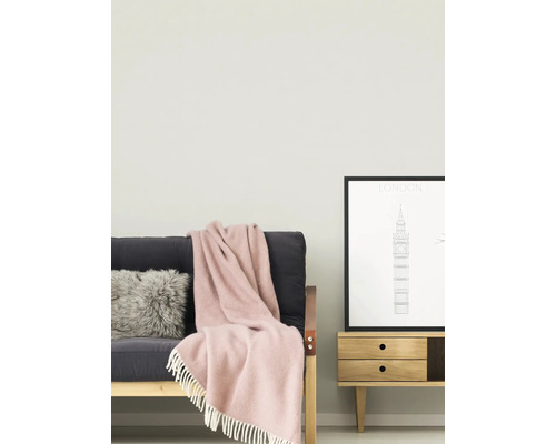 Scène de salon avec canapé, coussin, jeté de lit et table d''appoint avec motif de Londres