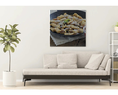 Tableau mural décoratif avec motif d''aliments au-dessus d''un canapé