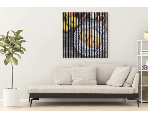 Image murale décorative avec des fruits et des aliments au-dessus d''un canapé