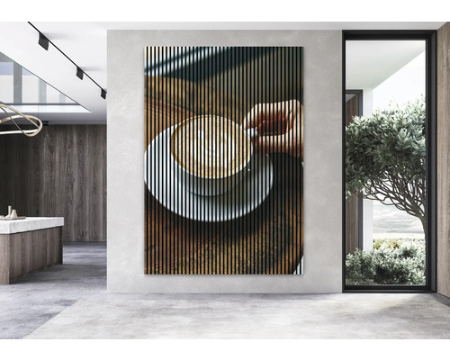 Tableau mural avec tasse à café sur une table dans un espace moderne