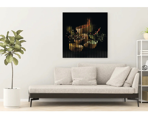 Salon avec canapé et tableau mural à motifs de fruits