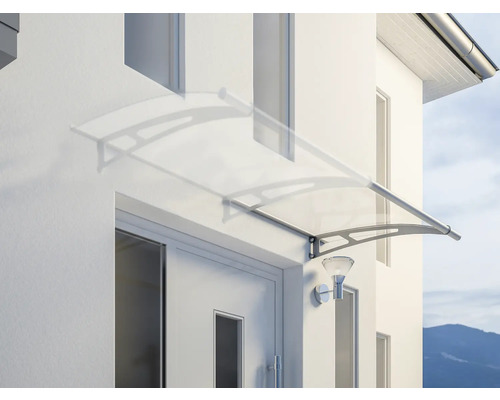Haustürvordach aus transparentem Material an einer Hauswand montiert