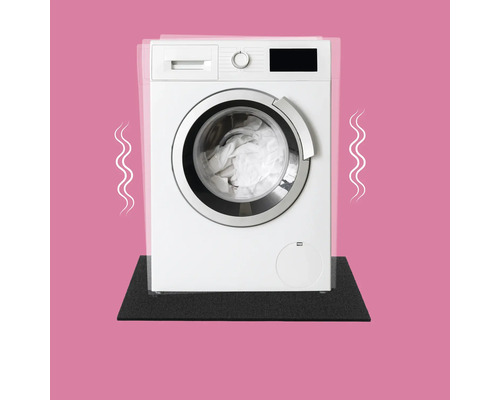 Eine Waschmaschine steht auf einer Antivibrationsmatte.