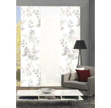 Salon avec rideaux coulissants à motif de feuilles