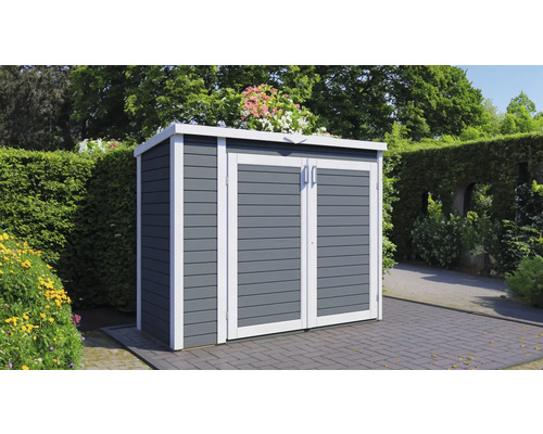 Abri de jardin en bois avec double porte dans le jardin