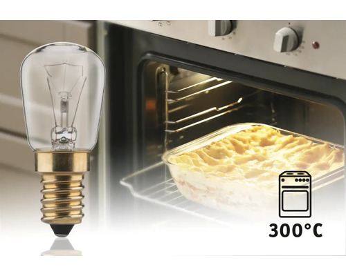 Lampe de four devant un four avec un gratin