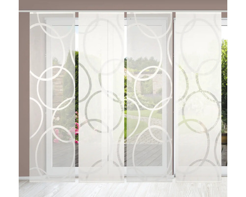 Panneau coulissant avec motif circulaire devant une porte-fenêtre