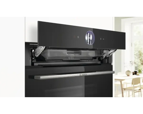 Four Bosch avec porte ouverte et panneau de commande